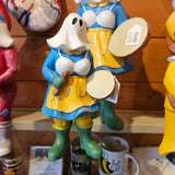 MUMMER PLAYING THE BODHRAN